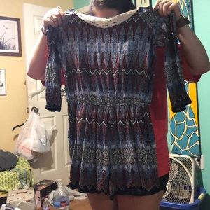 Romper, never been worn.